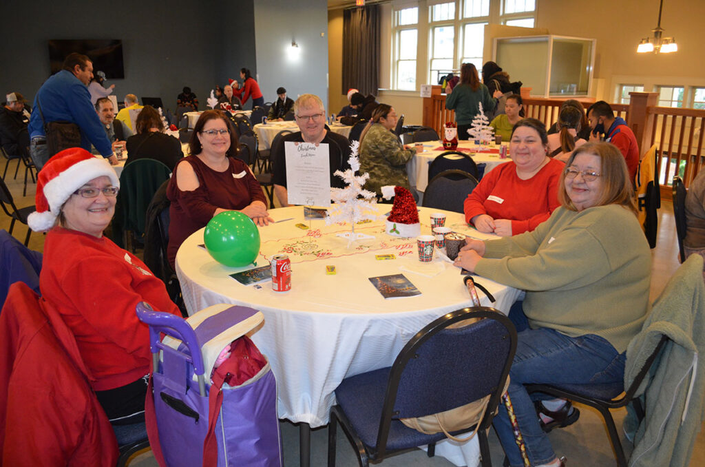 PHS 2023 Mental Health Christmas Party. Hall shot of staff, volunteers, and attendees